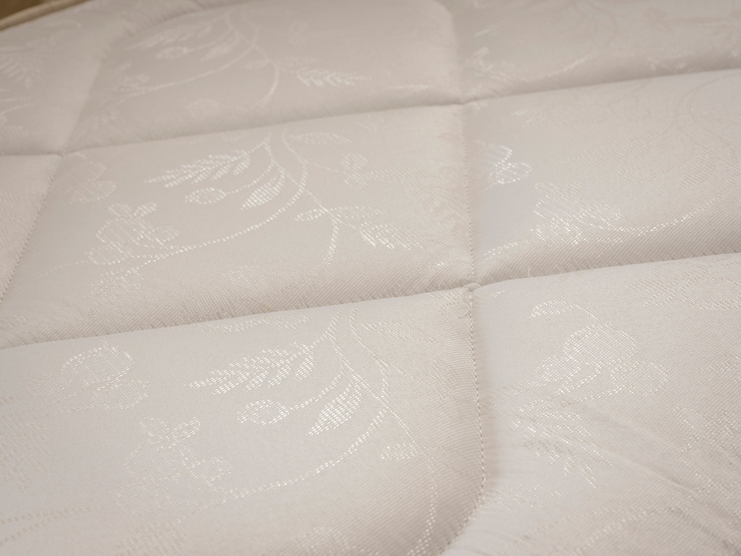 White damask cover open coil spring mattress by Tender Sleep, available in multiple sizes, featuring 13.5g springs.