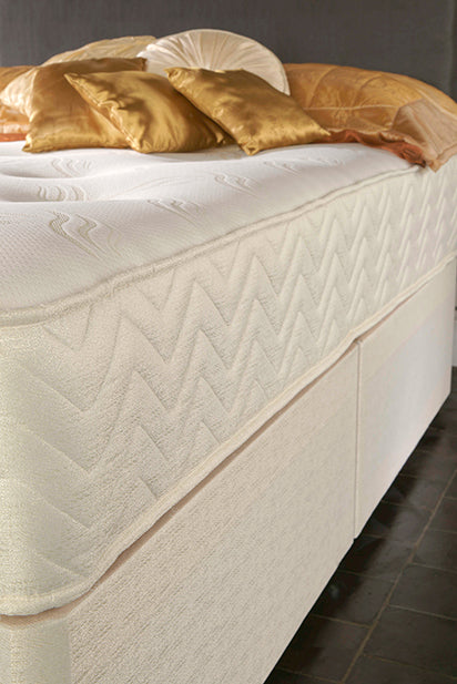 Memory sprung open coil mattress by Tender Sleep, featuring balanced support and comfort in a plush fabric cover.