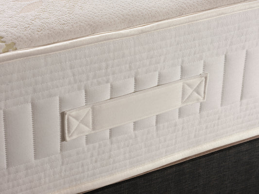 Organic cotton mattress with 2000 pocket springs and memory foam, in a firm design by Tender Sleep