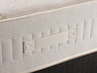 Organic cotton mattress with 2000 pocket springs and memory foam, in a firm design by Tender Sleep