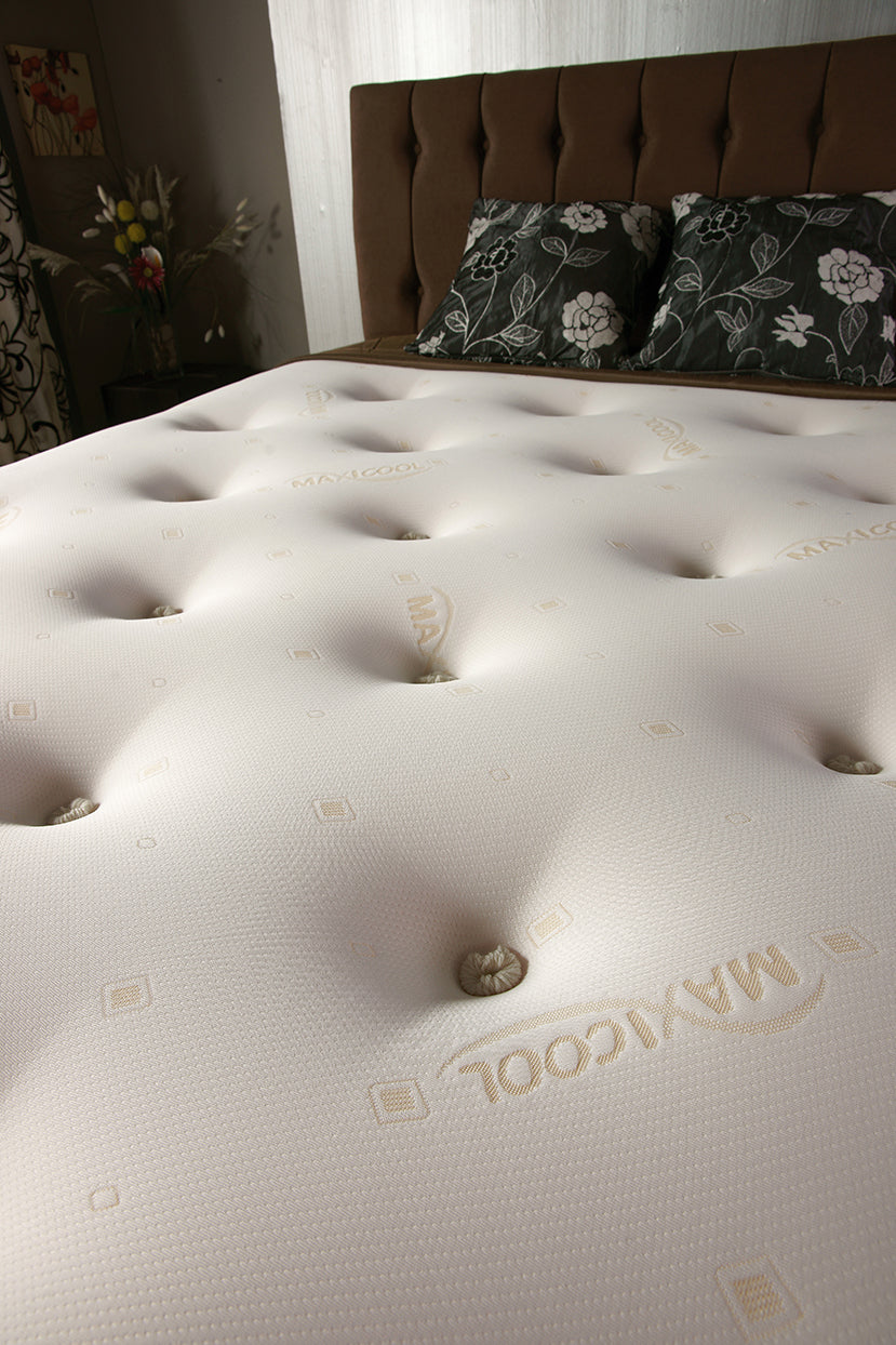 Tender Sleep medium firm orthopaedic mattress with a breathable faux leather base and body-contouring design